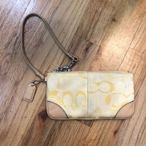 Coach yellow c logo wristlet